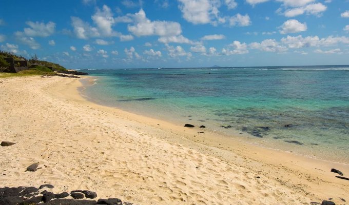 Location villa Ile Maurice pieds dans l'eau à Roches Noires avec personnel Cote Est