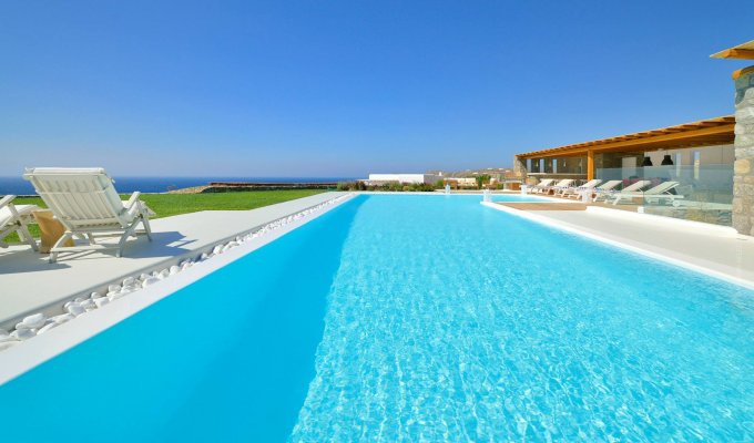 Grece Location Villa Mykonos vue mer avec piscine privée surplombant la baie d'Elia