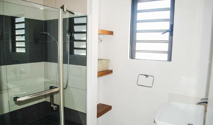 Location Appartement à Tamarin pieds dans l'eau avec piscine commune et wifi ,Ile Maurice