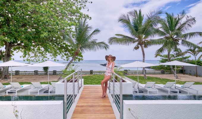 Location Penthouses Ile Maurice à Trou aux Biches en bord de mer avec piscine commune et jardin tropical