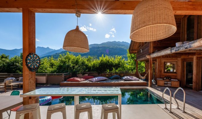 Location Chalet de Luxe proche pistes avec piscine chauffée spa sauna et services de conciergerie