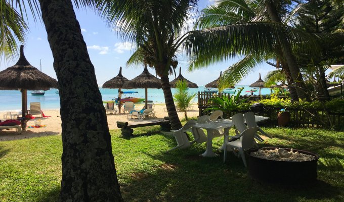 Location villa Ile Maurice Pieds dans l'eau sur la plage de Trou aux Biches avec personnel