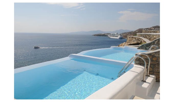Votre Séjour dans les Cyclades, en hébergement 8j/7 nuits à l'hôtel avec petit déjeuner en chambre Classique. Hôtel Cavo Tagoo 