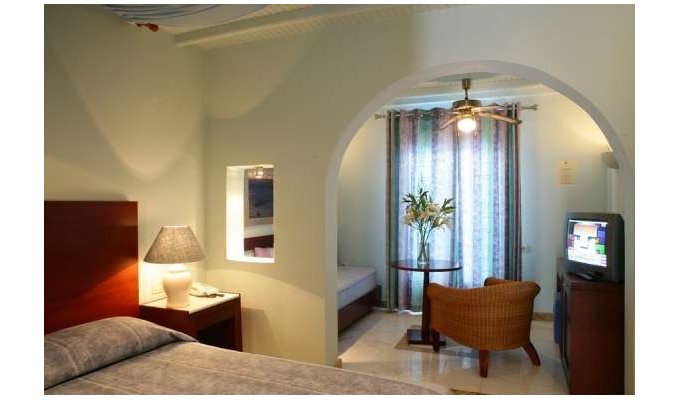 Votre Séjour en Grèce, en hébergement 8j/7 nuits à l'hôtel avec petit déjeuner en chambre avec vue sur le jardin. Hôtel Saint John Resort.